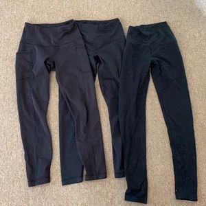 Three pairs of black leggings